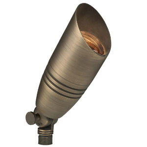 Architectural brass bullet spot light in antique bronze finish with adjustable shroud, MR16 socket, and ground spike mount – designed for outdoor landscape lighting.