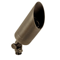 Brass hooded bullet up light for landscape lighting, shown in antique bronze finish with adjustable knuckle, clear convex lens, and ground mounting spike – compatible with 12V MR16 LED lamps.